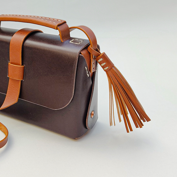 Leather Tassel Handbag Charm · How To Make A Tassel Charm · Jewelry on Cut  Out + Keep
